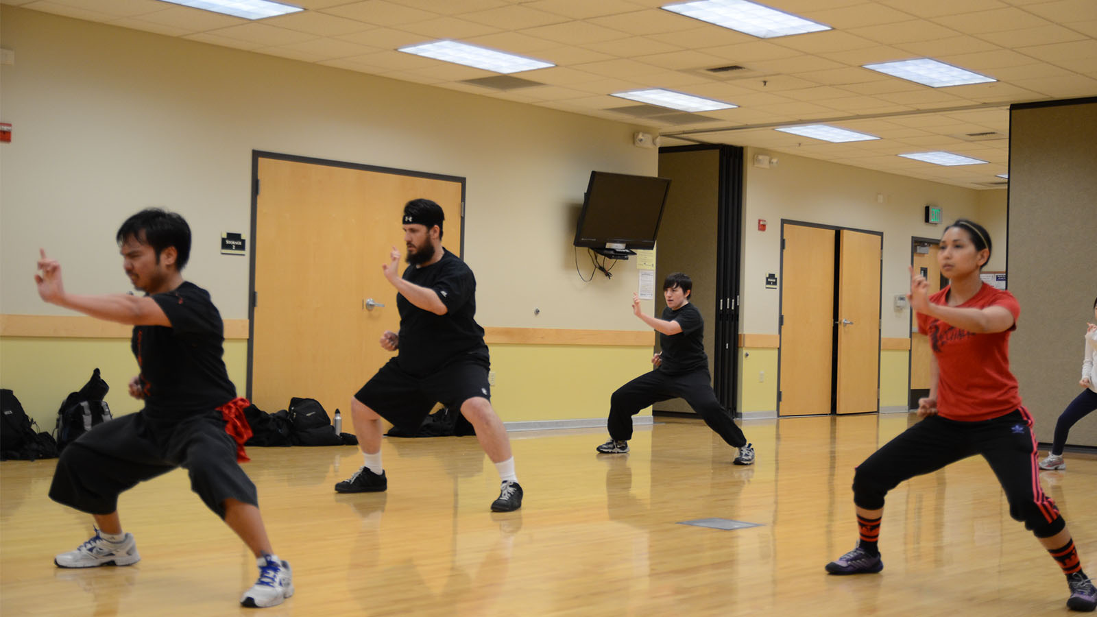 Student practicing kung fu forms